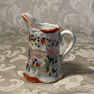 Vintage Japanese porcelain creamer with Orange Accents